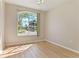 Bedroom with luxury floors and view at 1746 Golfview Dr, Kissimmee, FL 34746