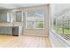 Kitchen with grey cabinets, stainless appliances and hardwood floors at 1746 Golfview Dr, Kissimmee, FL 34746