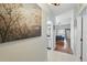 Inviting hallway that leads to the living room, kitchen and other rooms at 203 La Mirage St, Davenport, FL 33897