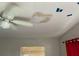 Ceiling damage present in this bedroom at 2329 W Doris St, Kissimmee, FL 34741