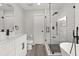 Modern bathroom featuring a soaking tub, walk in shower, and a white vanity at 2421 Deermeadow Dr, Apopka, FL 32703