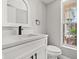 Stylish bathroom with a modern sink, matte black fixtures, and white vanity at 2421 Deermeadow Dr, Apopka, FL 32703