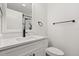 Stylish bathroom with a modern sink, matte black fixtures, and white vanity at 2421 Deermeadow Dr, Apopka, FL 32703
