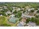 Aerial view of community with pool, tennis courts, and playground at 2421 Deermeadow Dr, Apopka, FL 32703