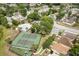 Aerial view of tennis courts, pool, and playground at 2421 Deermeadow Dr, Apopka, FL 32703