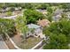 An aerial view of a well-maintained home with a manicured lawn and mature landscaping at 2421 Deermeadow Dr, Apopka, FL 32703