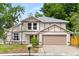 Charming two-story home featuring neutral paint, attached two car garage, and well-maintained lawn at 2421 Deermeadow Dr, Apopka, FL 32703