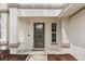 Close up of a lovely front door with sidelight at 2421 Deermeadow Dr, Apopka, FL 32703