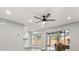 Bright living space with sliding doors to a screened lanai, and neutral color palette at 2421 Deermeadow Dr, Apopka, FL 32703