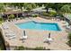 Community pool with ample seating, providing a relaxing and inviting atmosphere for residents at 2421 Deermeadow Dr, Apopka, FL 32703