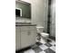 Bathroom with new vanity, granite countertop, and tiled shower at 2453 Sipes Ave, Sanford, FL 32771
