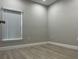 Bedroom featuring new flooring, and plenty of natural light at 2453 Sipes Ave, Sanford, FL 32771