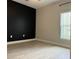 Bedroom featuring new flooring, a modern accent wall and plenty of natural light at 2453 Sipes Ave, Sanford, FL 32771