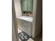 The laundry room includes modern washer and dryer, with trendy green cabinets and decorative backsplash at 2453 Sipes Ave, Sanford, FL 32771