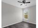 Bright bedroom features a ceiling fan, window and neutral color palette at 248 Country Landing Blvd, Apopka, FL 32703