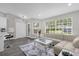 Bright living room featuring lots of natural light, neutral colored walls, and modern decor at 248 Country Landing Blvd, Apopka, FL 32703