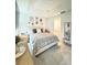 Relaxing main bedroom with a cozy bed, neutral tones, and easy access to an ensuite bathroom at 2547 Trielle Ave, Kissimmee, FL 34741