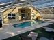 Outdoor pool and patio area, perfect for relaxing and enjoying the beautiful weather at 2567 Oneida Loop, Kissimmee, FL 34747