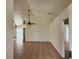 Spacious living room featuring tile flooring and a ceiling fan at 260 Piccolo Way, Davenport, FL 33896