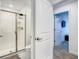 Modern bathroom with glass shower and tile flooring at 2970 Protagonist St, Kissimmee, FL 34746
