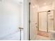 Bright bathroom featuring tile flooring, a glass shower, and a toilet with modern fixtures at 2970 Protagonist St, Kissimmee, FL 34746