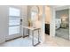 Bright foyer featuring marble floors, a modern console table, and views of the bedroom and bathroom at 2970 Protagonist St, Kissimmee, FL 34746