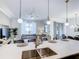 Bright kitchen with seamless access to the living and dining areas at 2970 Protagonist St, Kissimmee, FL 34746