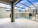 Enclosed backyard pool with safety fence and covered patio area, perfect for recreation and relaxation at 2970 Protagonist St, Kissimmee, FL 34746