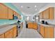Spacious kitchen with stainless appliances, generous counters, and open layout at 303 Plumoso Loop, Davenport, FL 33897