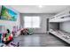 Spacious bedroom featuring bunk beds, luxury vinyl plank flooring, and neutral wall colors, creating a versatile space at 320 Southern Winds Blvd, Deland, FL 32720