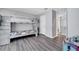 Bedroom featuring bunk beds, luxury vinyl plank flooring, and neutral wall colors, creating a versatile space at 320 Southern Winds Blvd, Deland, FL 32720
