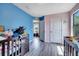 Bright bedroom featuring colorful walls and a doorway, creating a fun and inviting space for  at 320 Southern Winds Blvd, Deland, FL 32720