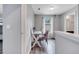 Hallway area with built in desk and computer and luxury vinyl plank flooring; great work from home space at 320 Southern Winds Blvd, Deland, FL 32720