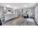 Bright kitchen and dining area offering ample space for cooking, dining, and entertaining guests at 320 Southern Winds Blvd, Deland, FL 32720