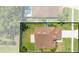 Birds eye view of backyard with well-maintained fence that provides a private outdoor space for relaxation and entertainment at 3203 Herons Point Cir, Kissimmee, FL 34741