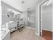 Bright bathroom featuring a glass enclosed shower and dual vessel sinks at 3203 Herons Point Cir, Kissimmee, FL 34741