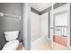 Bathroom featuring a toilet, bathtub, and a window to allow natural light at 3203 Herons Point Cir, Kissimmee, FL 34741