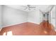 Bedroom featuring hardwood floors, natural light, and neutral color scheme at 3203 Herons Point Cir, Kissimmee, FL 34741