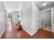 Entryway area leading to the stairs, main living space and a partial bath at 3203 Herons Point Cir, Kissimmee, FL 34741