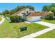 Lovely two-story home with a well-maintained lawn and a two-car garage at 3203 Herons Point Cir, Kissimmee, FL 34741