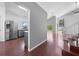 Open-concept kitchen and living area with stainless steel appliances and lots of natural light at 3203 Herons Point Cir, Kissimmee, FL 34741
