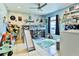 Playful bedroom with loft bed, slide, and plenty of space for toys and creativity at 330 Chiquita Ct, Kissimmee, FL 34758