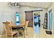 Dining area features a round table with chairs and a sliding barn door at 330 Chiquita Ct, Kissimmee, FL 34758