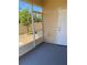 View of the enclosed patio showing the door to the backyard at 4855 Coral Castle Dr, Kissimmee, FL 34746