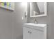 Modern bathroom with a sleek vanity, minimalist design and a contemporary mirror at 4981 Alita Ter, St Cloud, FL 34769