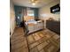 Comfortable bedroom featuring a queen-sized bed, neutral decor, and a large window for ample natural light at 4981 Alita Ter, St Cloud, FL 34769