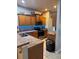 Well-equipped kitchen featuring wooden cabinets, modern appliances, and ample countertop space for cooking convenience at 4981 Alita Ter, St Cloud, FL 34769