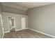 Bright bedroom features modern flooring, large closet, and neutral wall color at 5017 Laguna Bay Cir # 96, Kissimmee, FL 34746