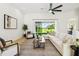 Spacious living room featuring lots of natural light and elegant decor at 517 Milano Rd, Poinciana, FL 34759