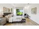 Well-lit main bedroom featuring a sliding door to the outdoors and elegant decor at 517 Milano Rd, Poinciana, FL 34759